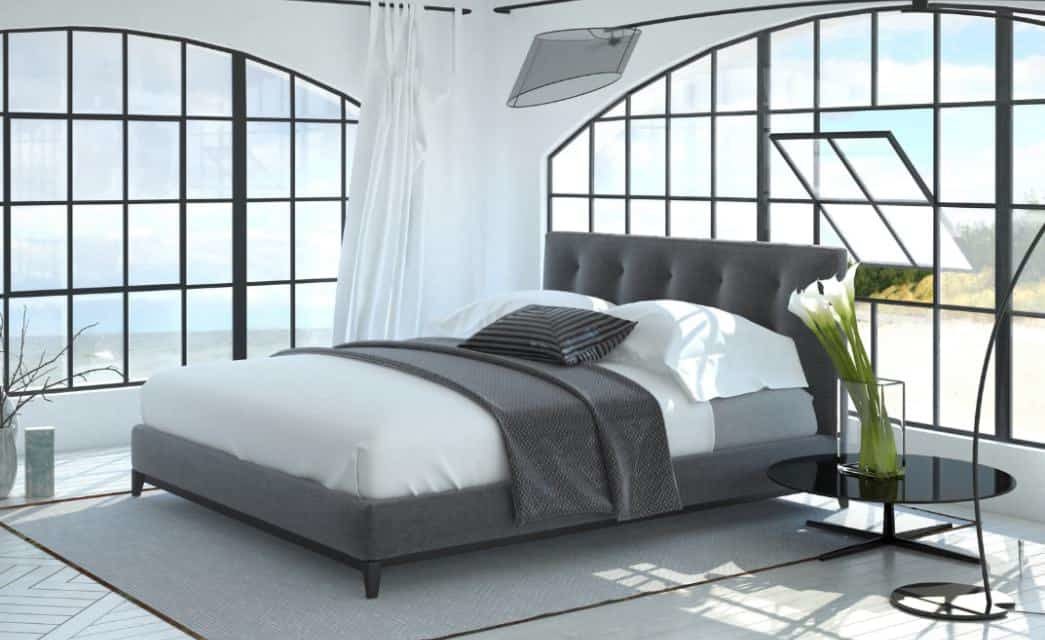 bedroom with white and gray linens